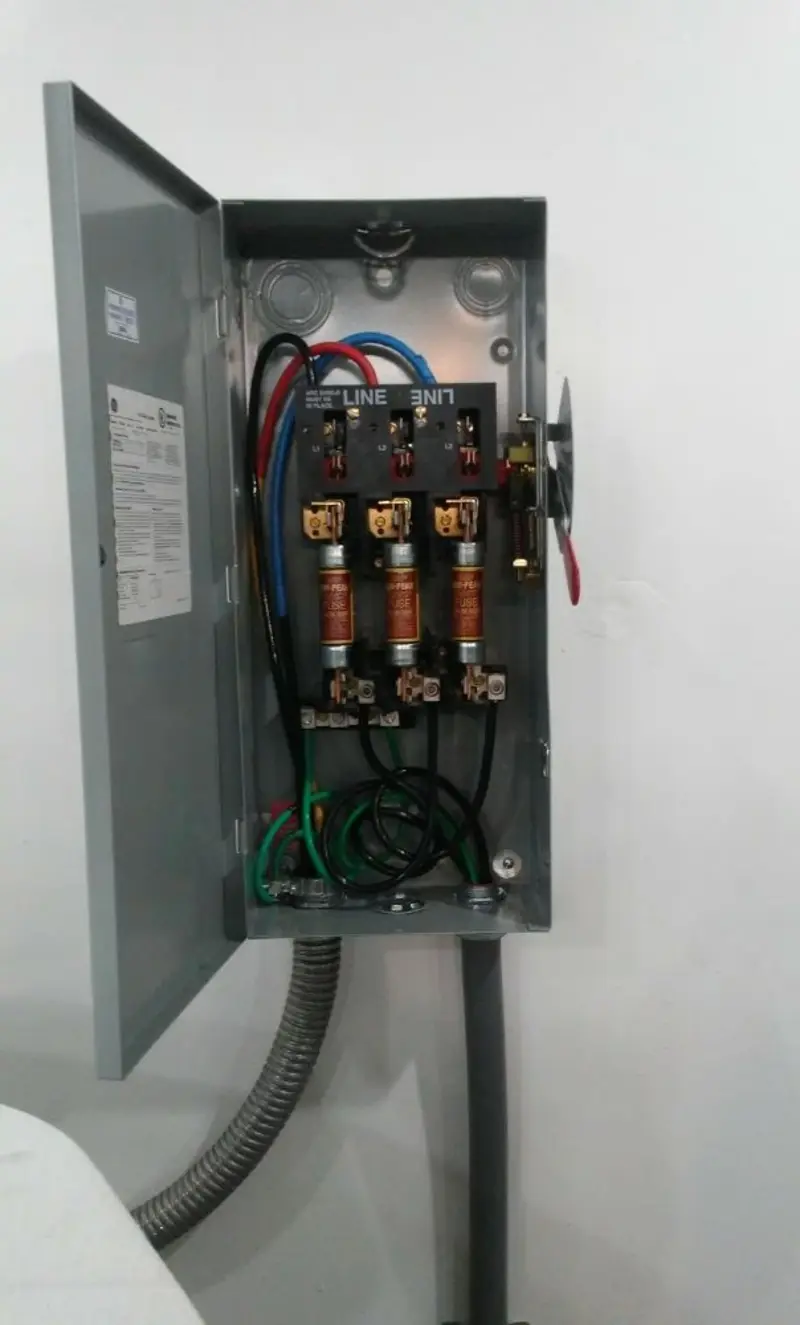 Three-phase disconnect switch installed for Smoke Detector Installation in Homeland